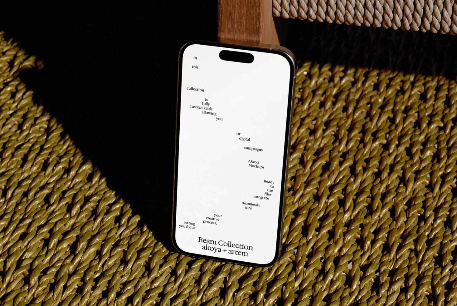 iPhone mockup displaying Beam Collection text layout on woven textile background with wood accents