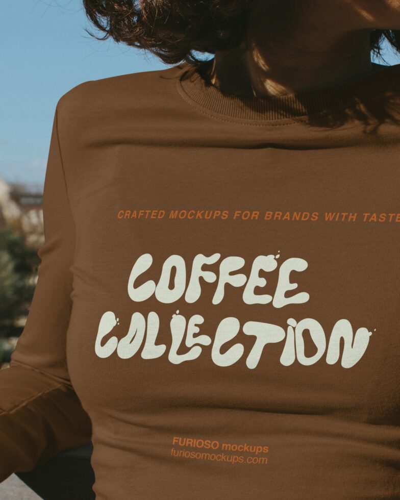 Brown long sleeve tee with coffee collection print worn outdoors