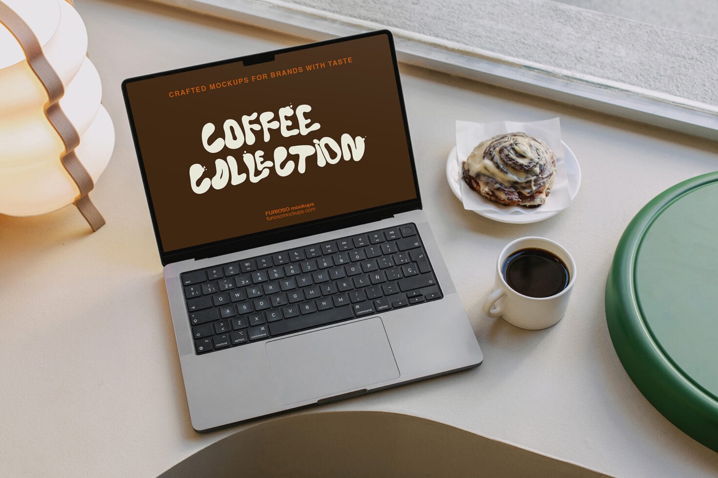 Brown screen mockup with coffee collection text next to espresso cup pastry lamp