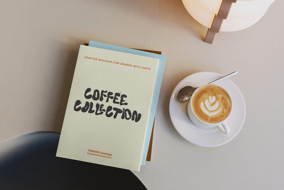 Cream cover with black handwritten text next to latte with latte art