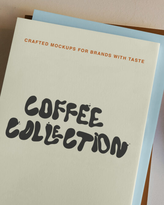 Cream cover with dark handwritten text, blue inner pages showing