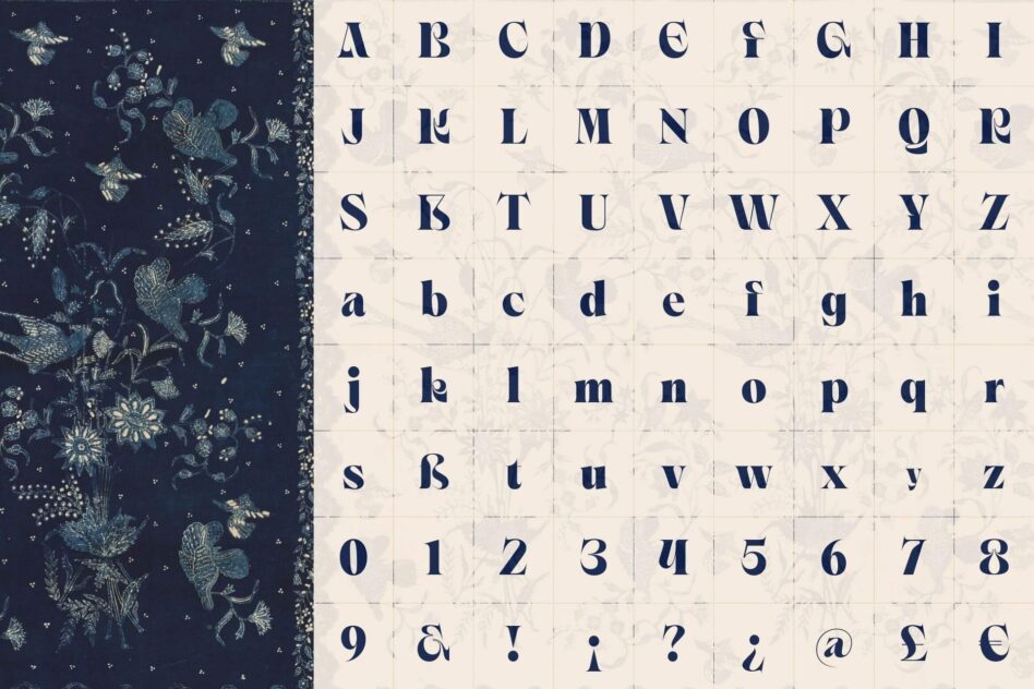 Font specimen showing uppercase, lowercase, numbers, plus punctuation in deep navy on cream grid paper with botanical fabric swatch