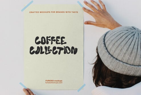 Person in beanie holding cream poster with Coffee Collection text, blue tape corners