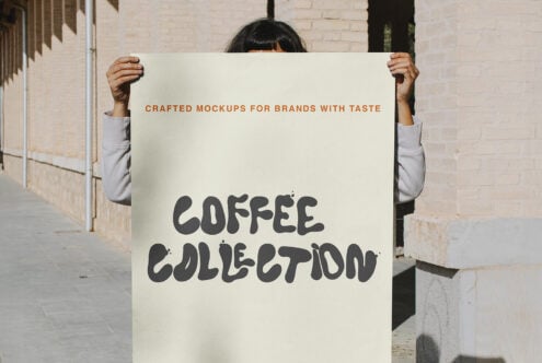 Person holding cream poster with dark text saying Coffee Collection outdoors