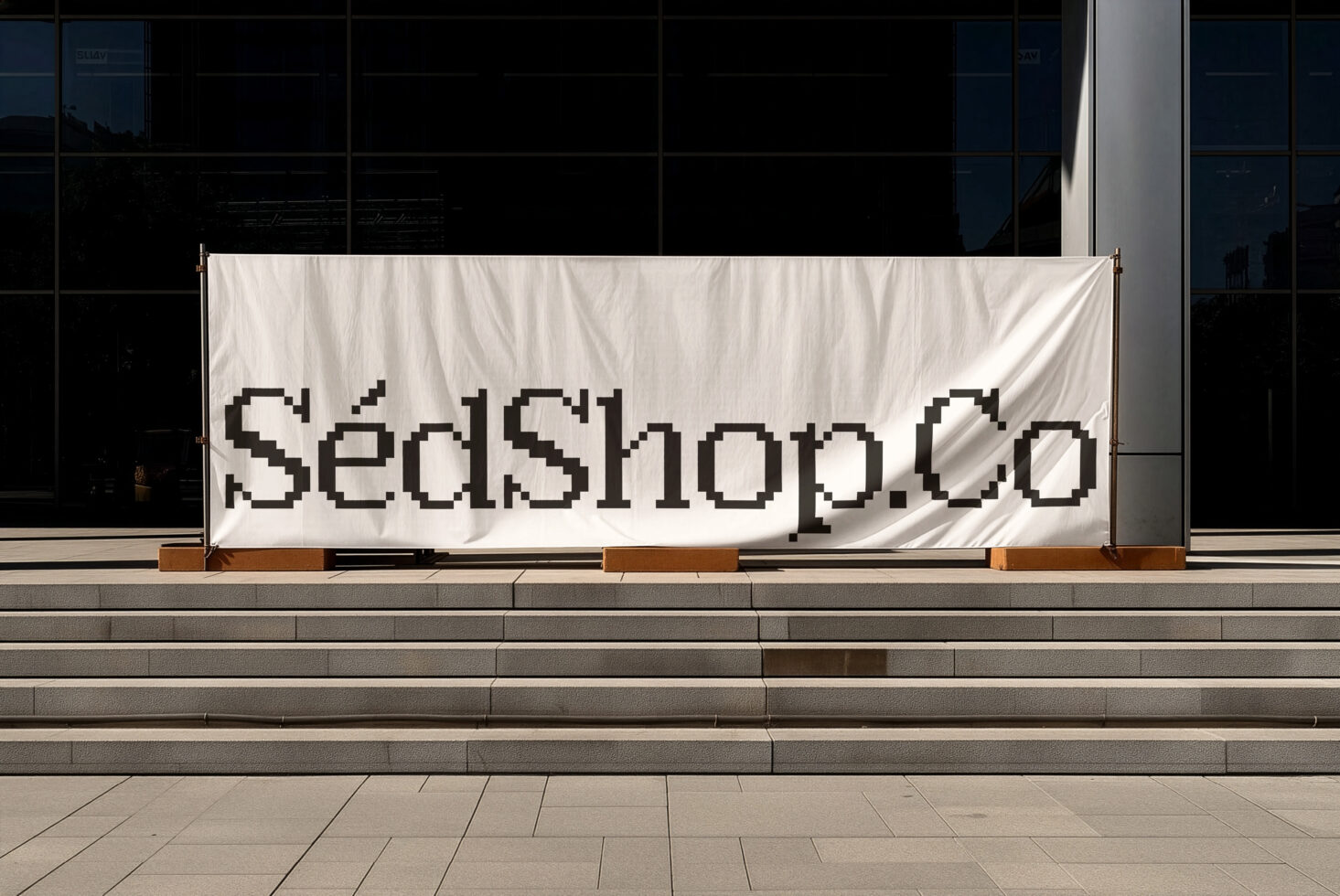 Clean white storefront banner displaying pixel-style sans-serif text