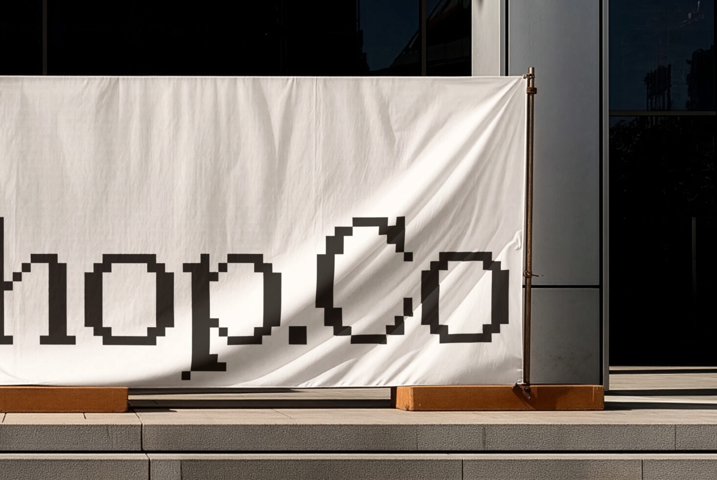 White storefront banner with large pixelated numbers casting shadows