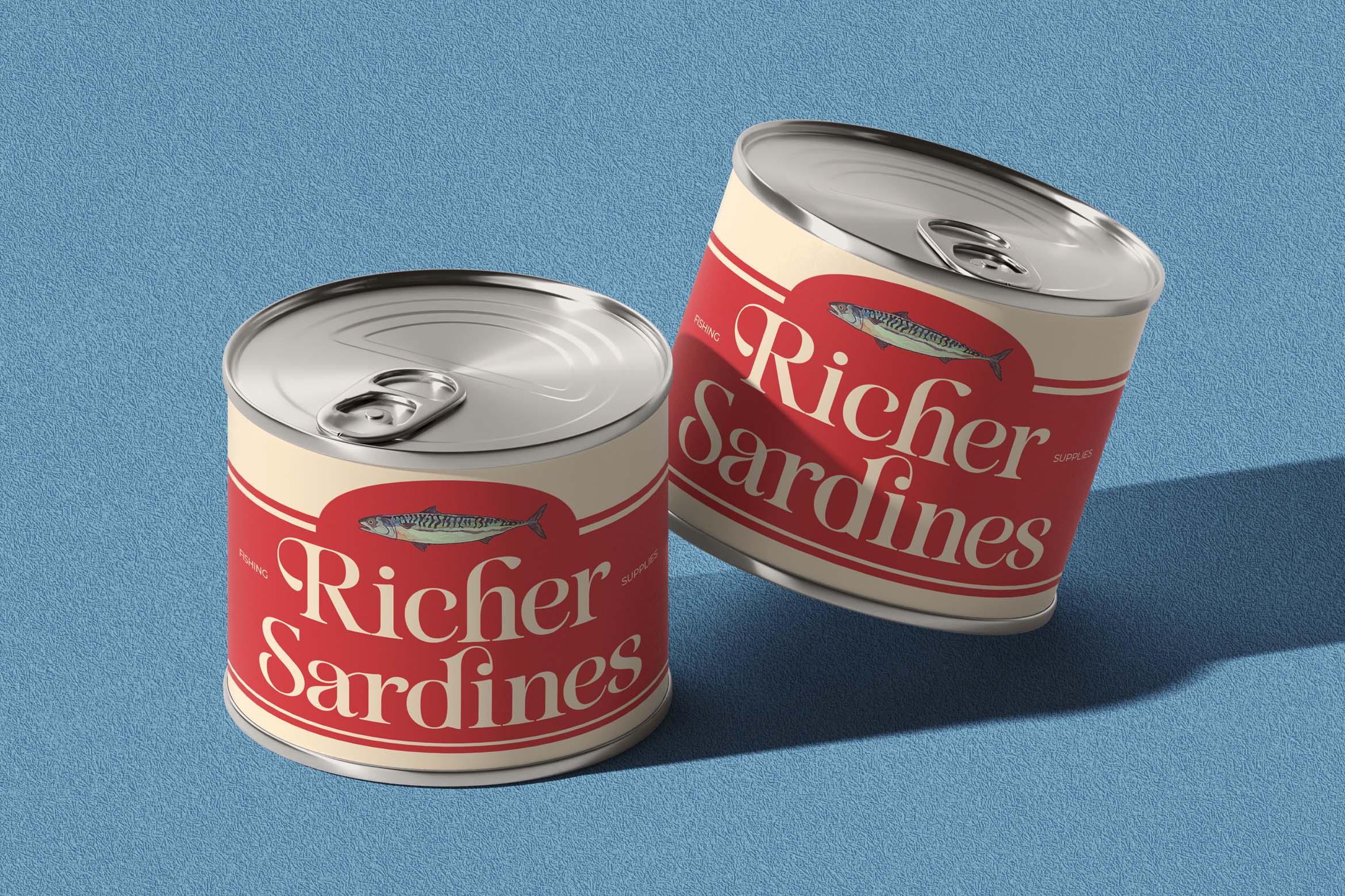 Two metal sardine cans with red labels on blue background