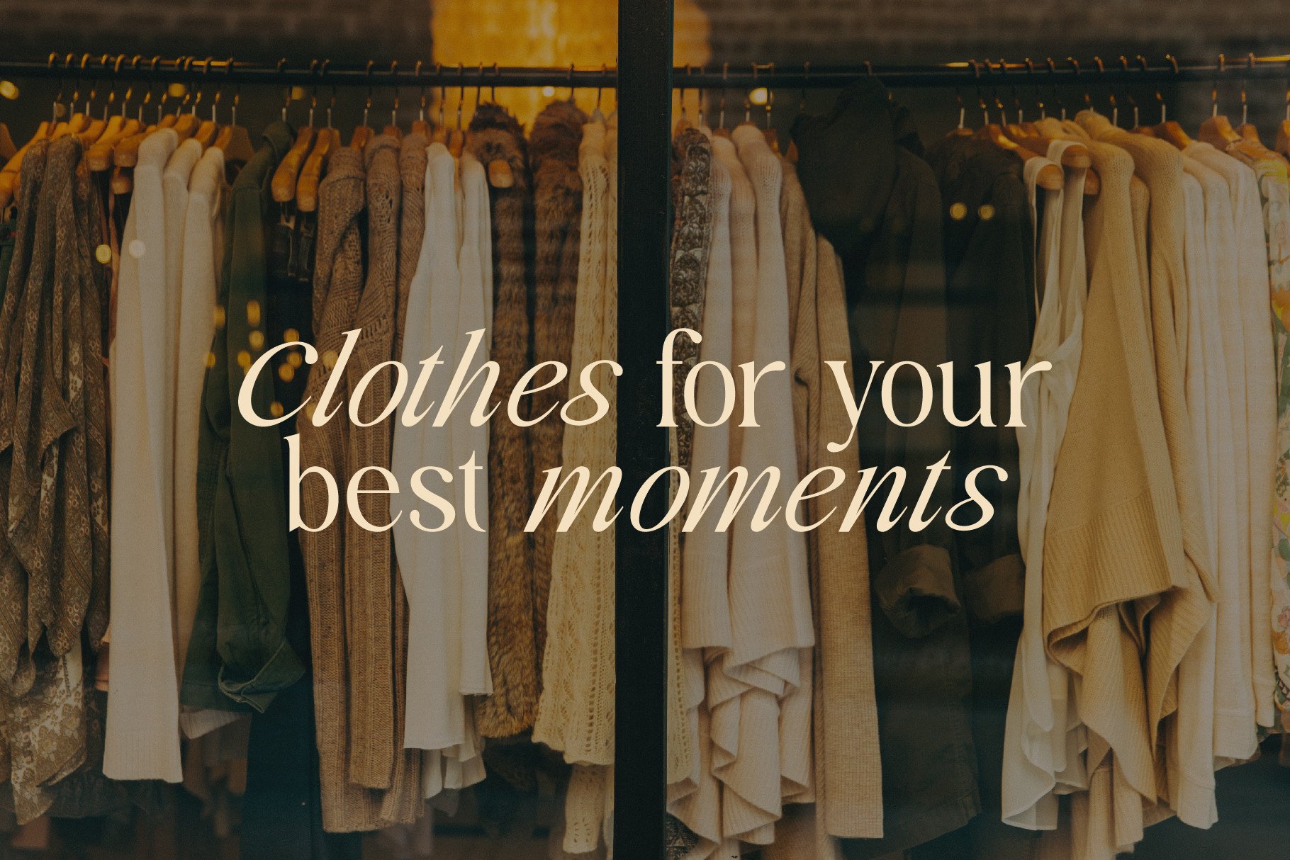 Clothing rack with neutral beige, cream, brown garments displayed on wooden hangers