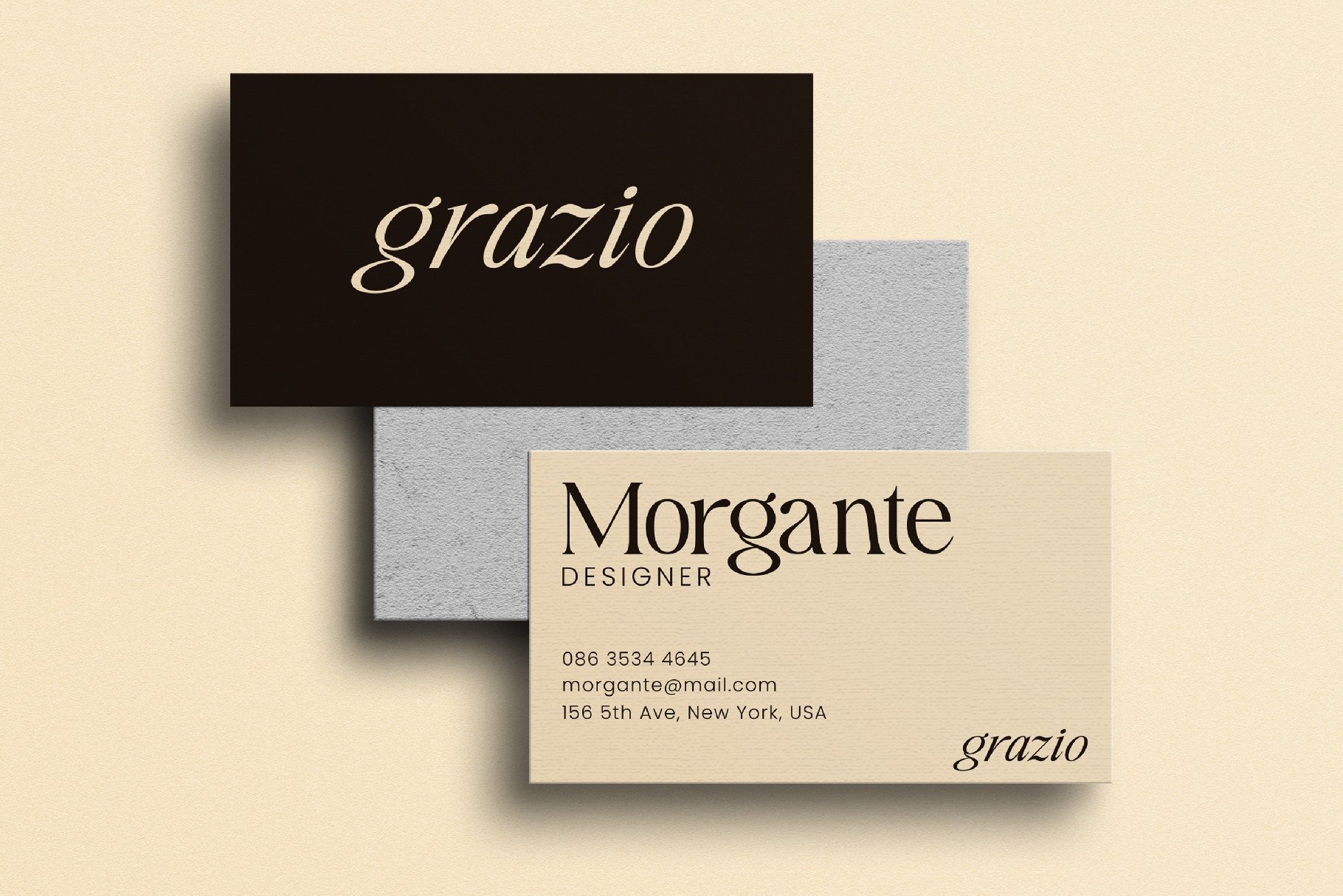 Overlapping business cards for Morgante Designer with grazio branding in cream tones
