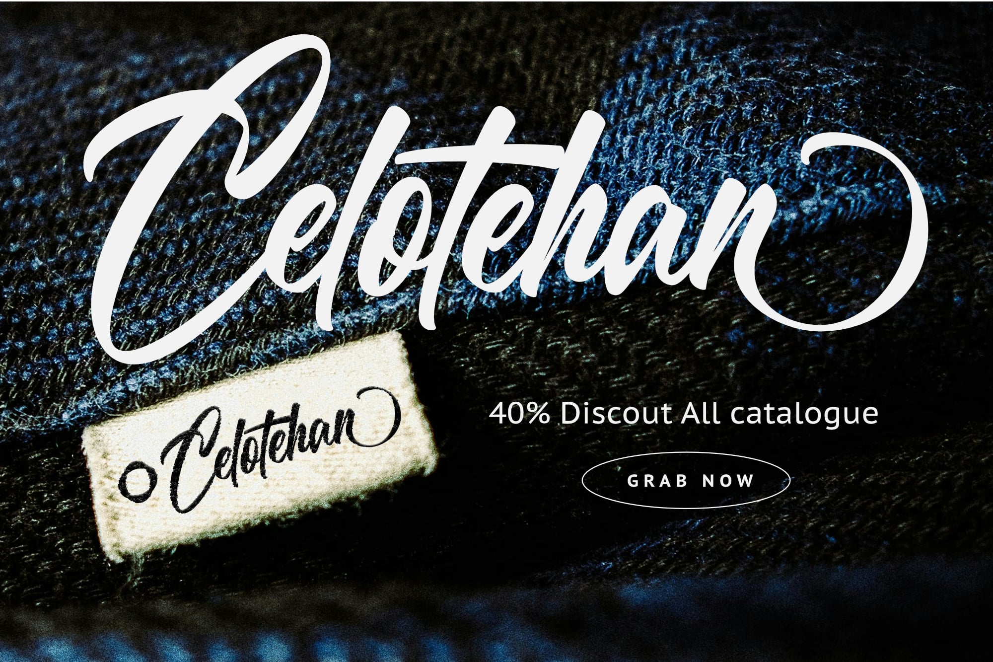 White script lettering on dark blue textured fabric with woven label detail
