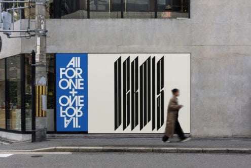 Bold street billboard mockup with blue geometric panel plus cream side featuring black striped type design
