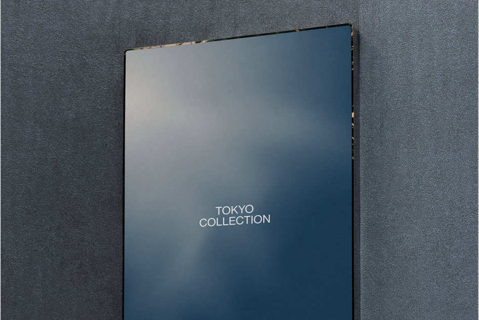 Dark blue book cover mockup with Tokyo Collection text on textured gray background