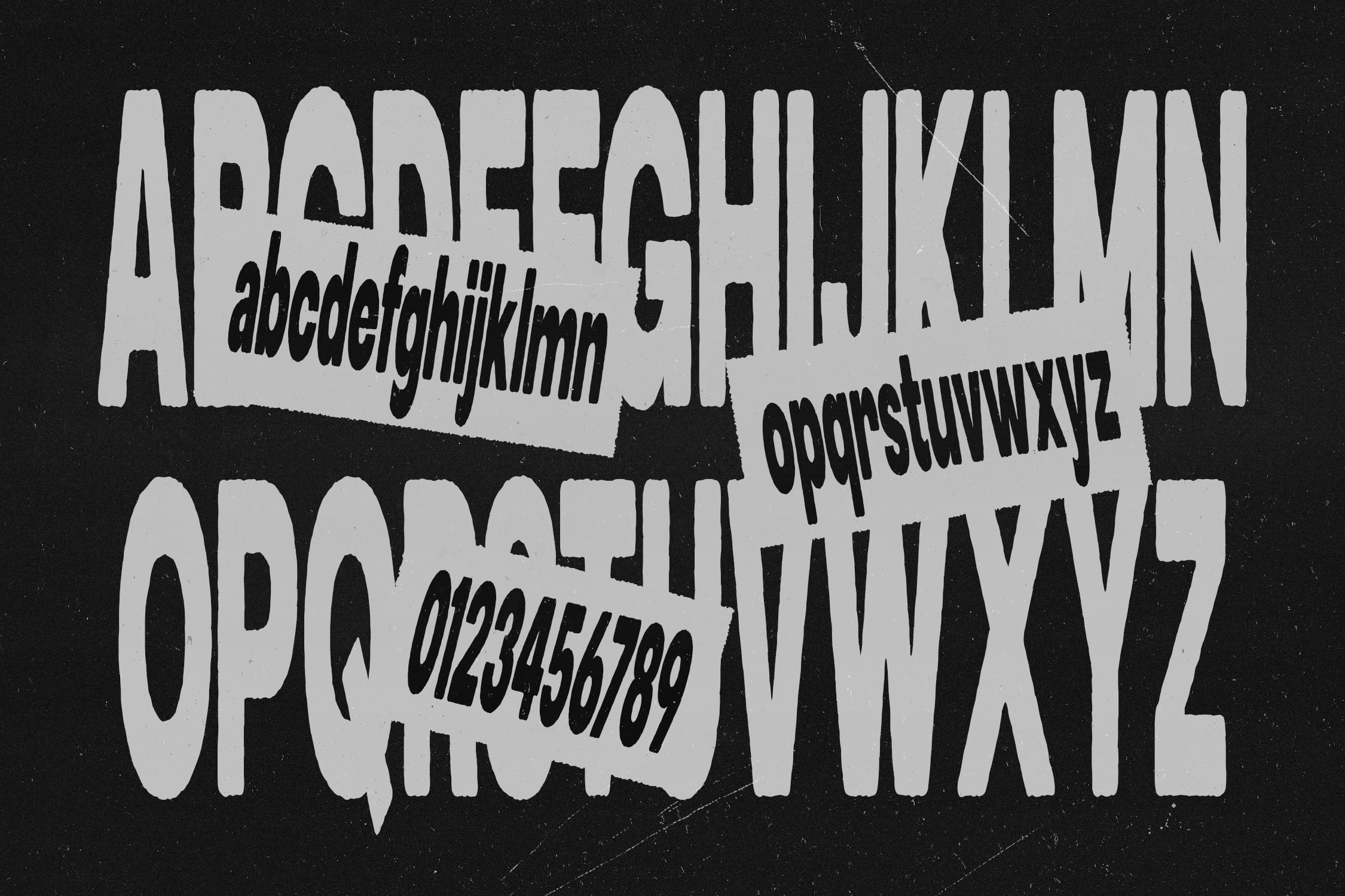 Squeezed display font showing compressed uppercase letters with full character set