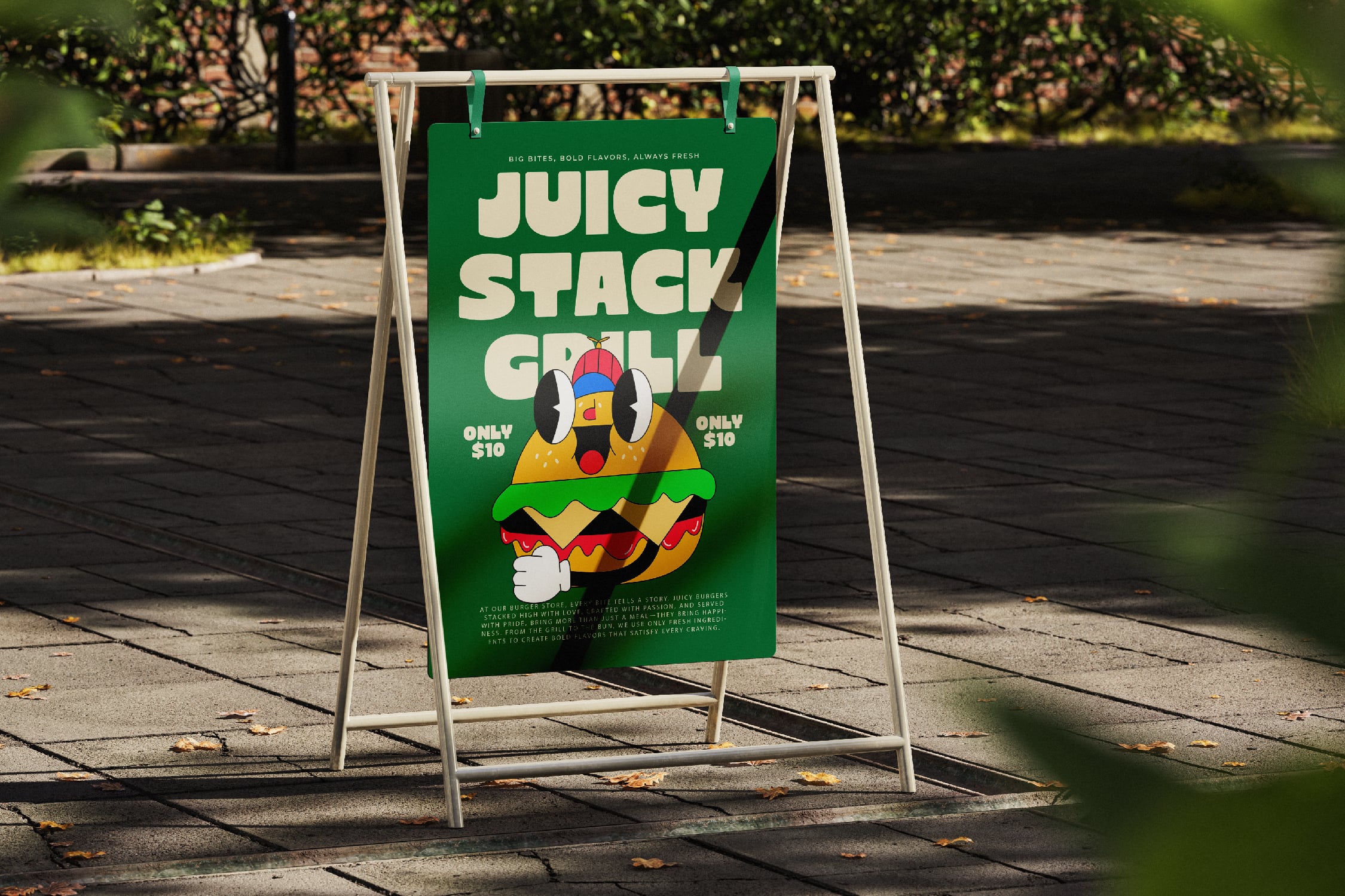 Outdoor A-frame sign displaying bold green poster for "Juicy Stack Grrl" burger shop with colorful illustration