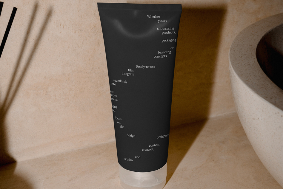 Black tube mockup with white text on neutral beige background with shadows