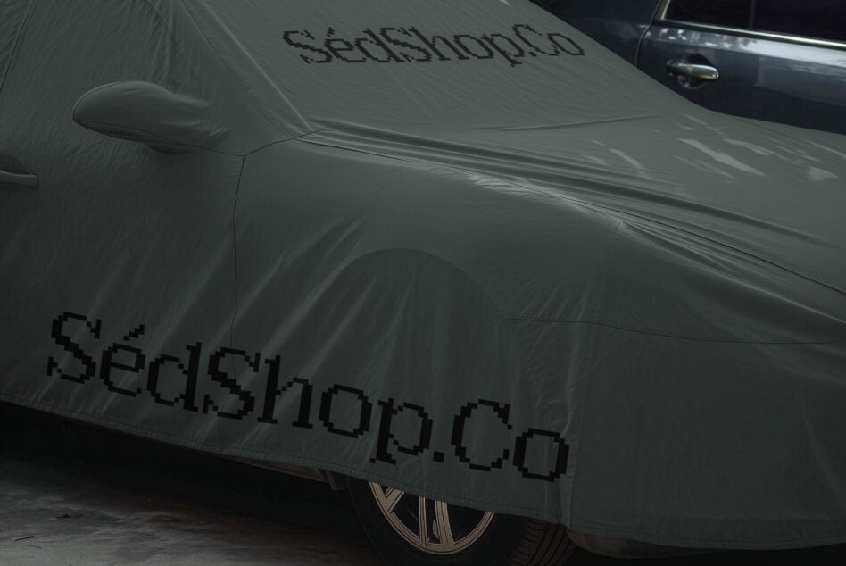 Car cover mockup on sedan with pixelated text showing branding placement