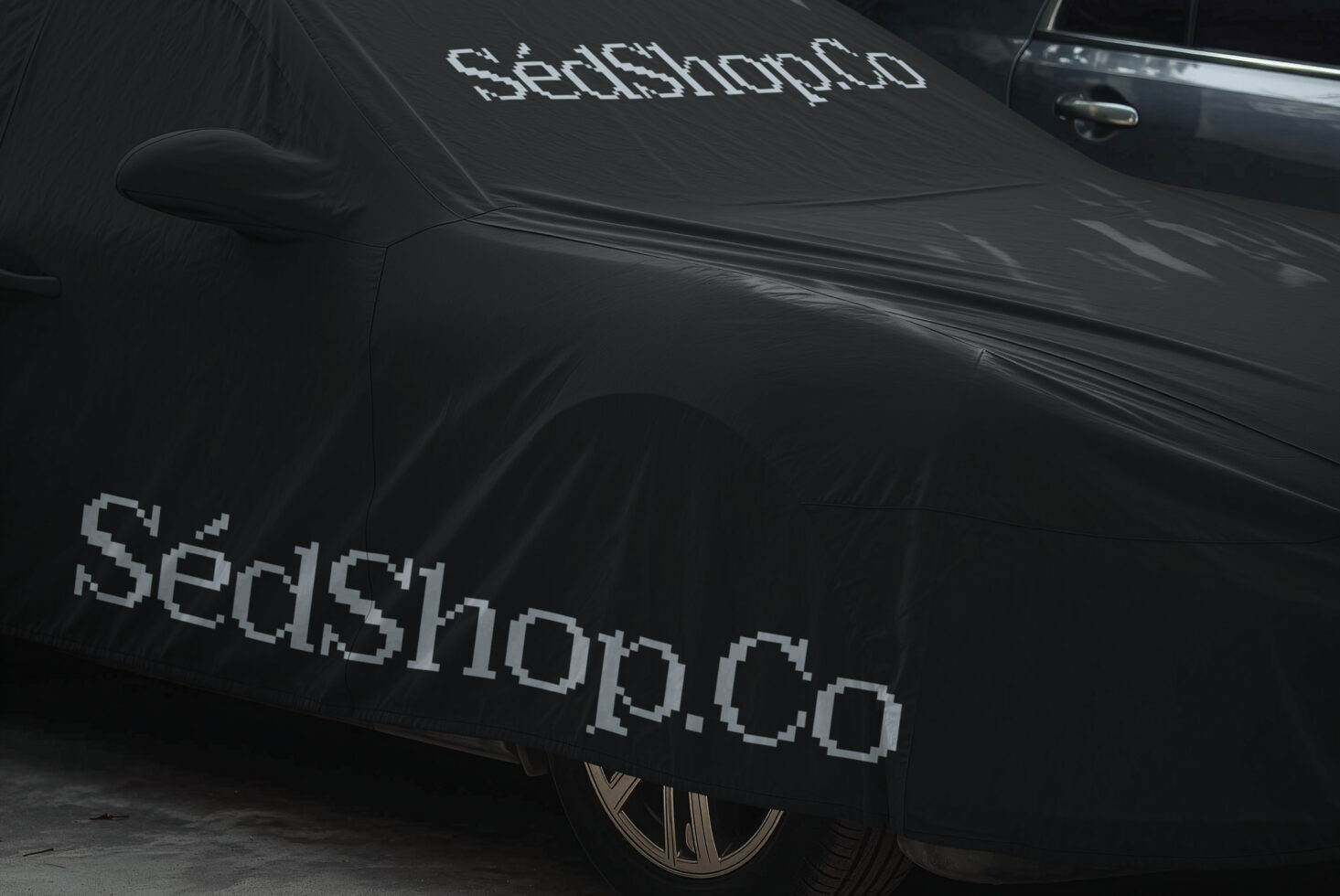 Black car side view with pixelated white text decals on hood, door, plus metallic wheel detail