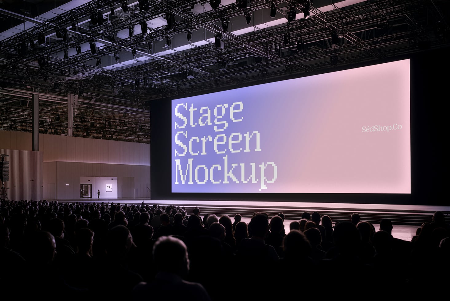 Large projection screen at concert venue with pixel art text on pink gradient backdrop
