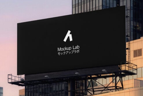 Oversized billboard mockup featuring minimalist logo with Japanese text on urban rooftop at dusk
