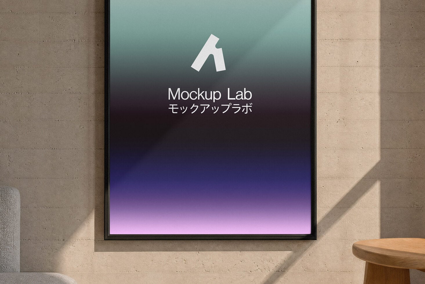 Tablet screen showing Mockup Lab logo with teal to purple gradient background on concrete wall