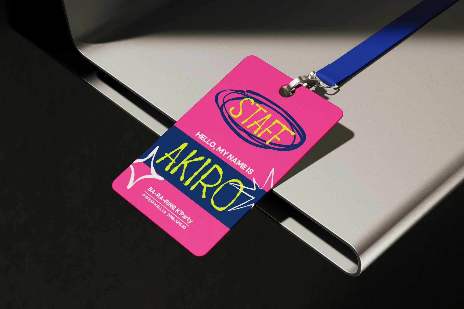 Bright pink event badge mockup with blue lanyard, neon yellow typography, sat on curved black surface