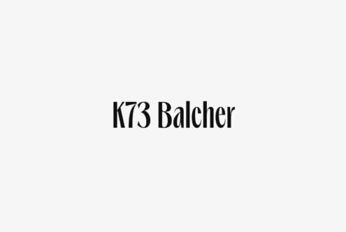 K73 Balcher serif font displayed in bold black text on light gray background