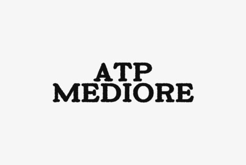 ATP Mediore font in bold black serif letters on light beige background