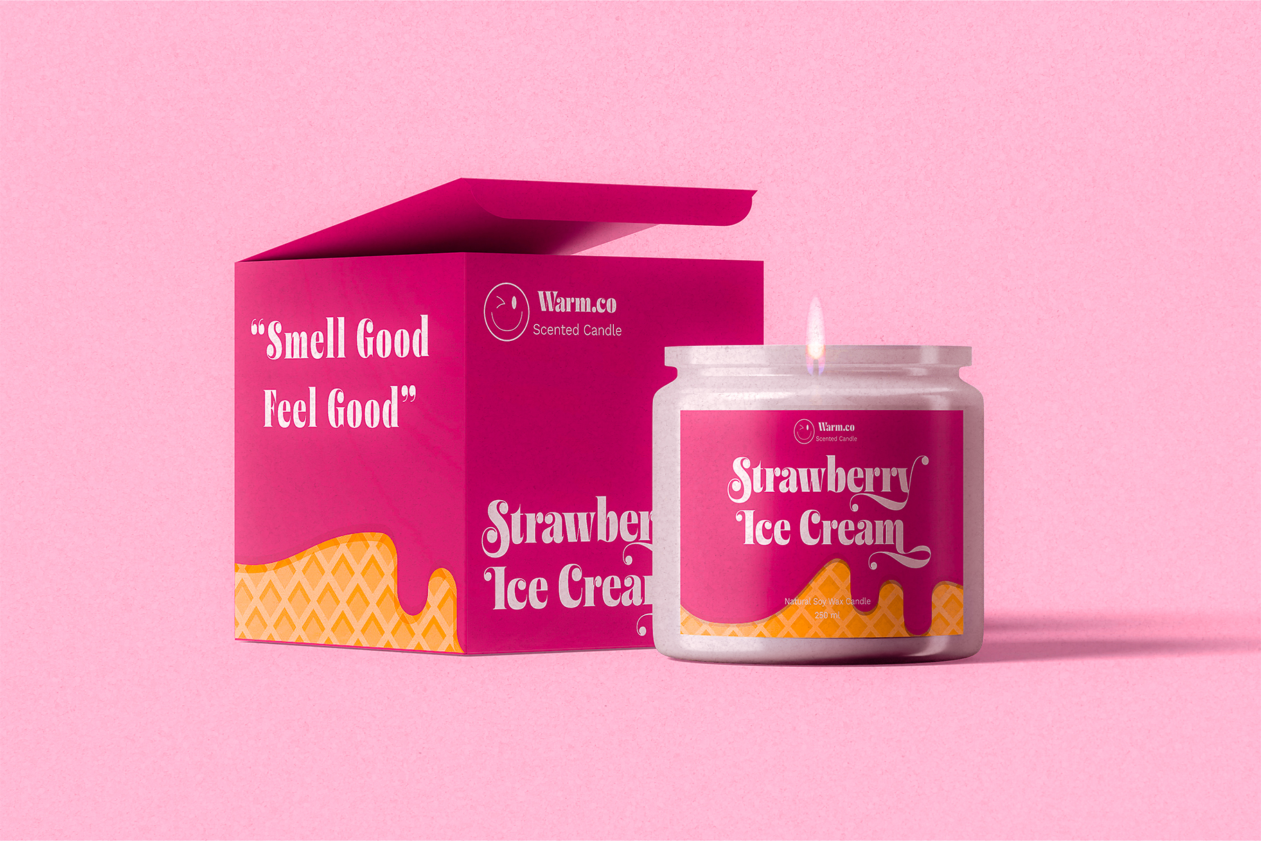 Bright pink candle box with open lid next to glass jar showing strawberry ice cream scented candle design