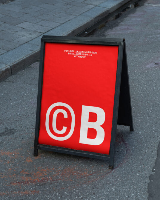 Bright red A-frame sidewalk sign mockup with bold white letters on urban pavement