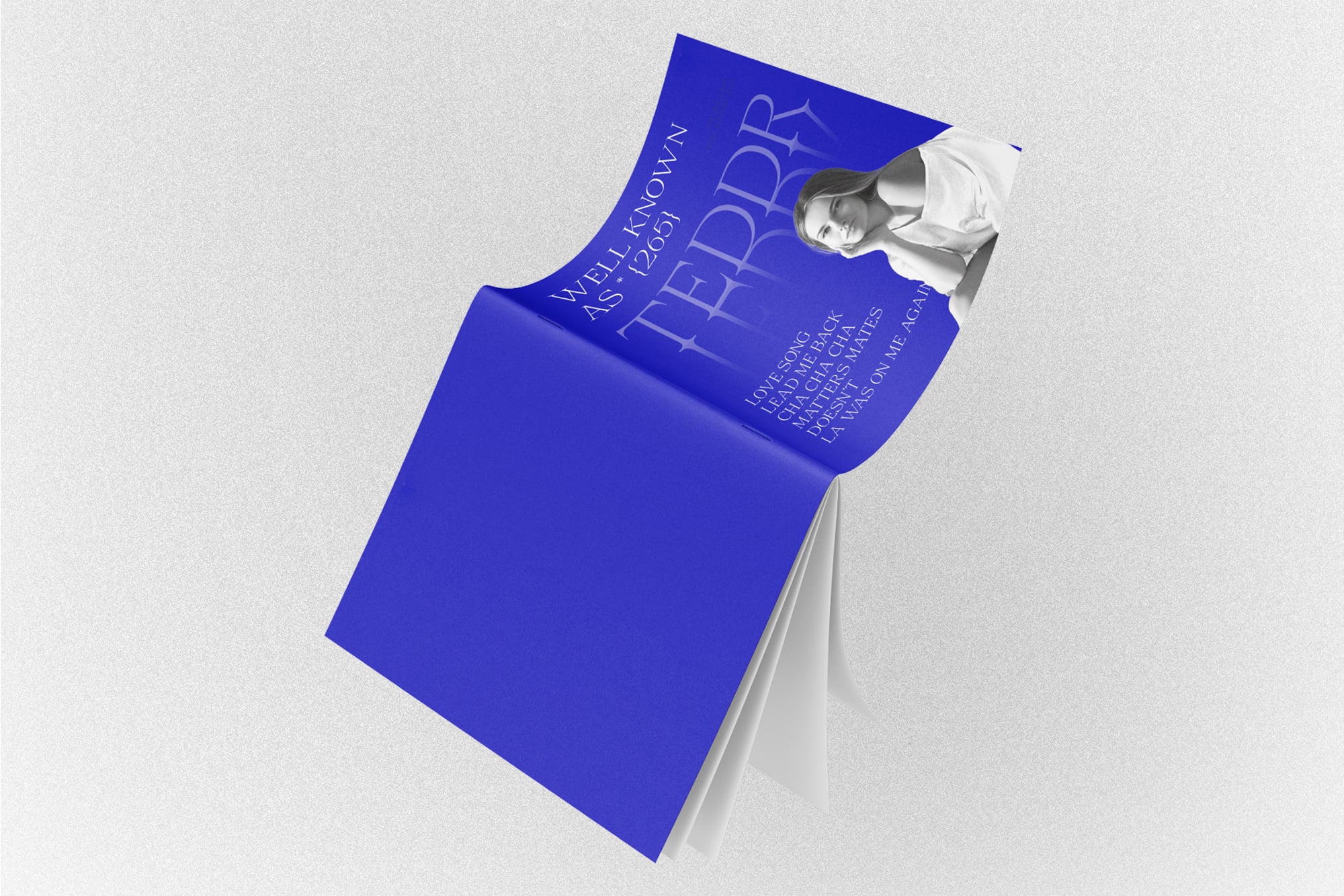 Bright blue trifold brochure mockup with portrait photo, angled 3D perspective shot