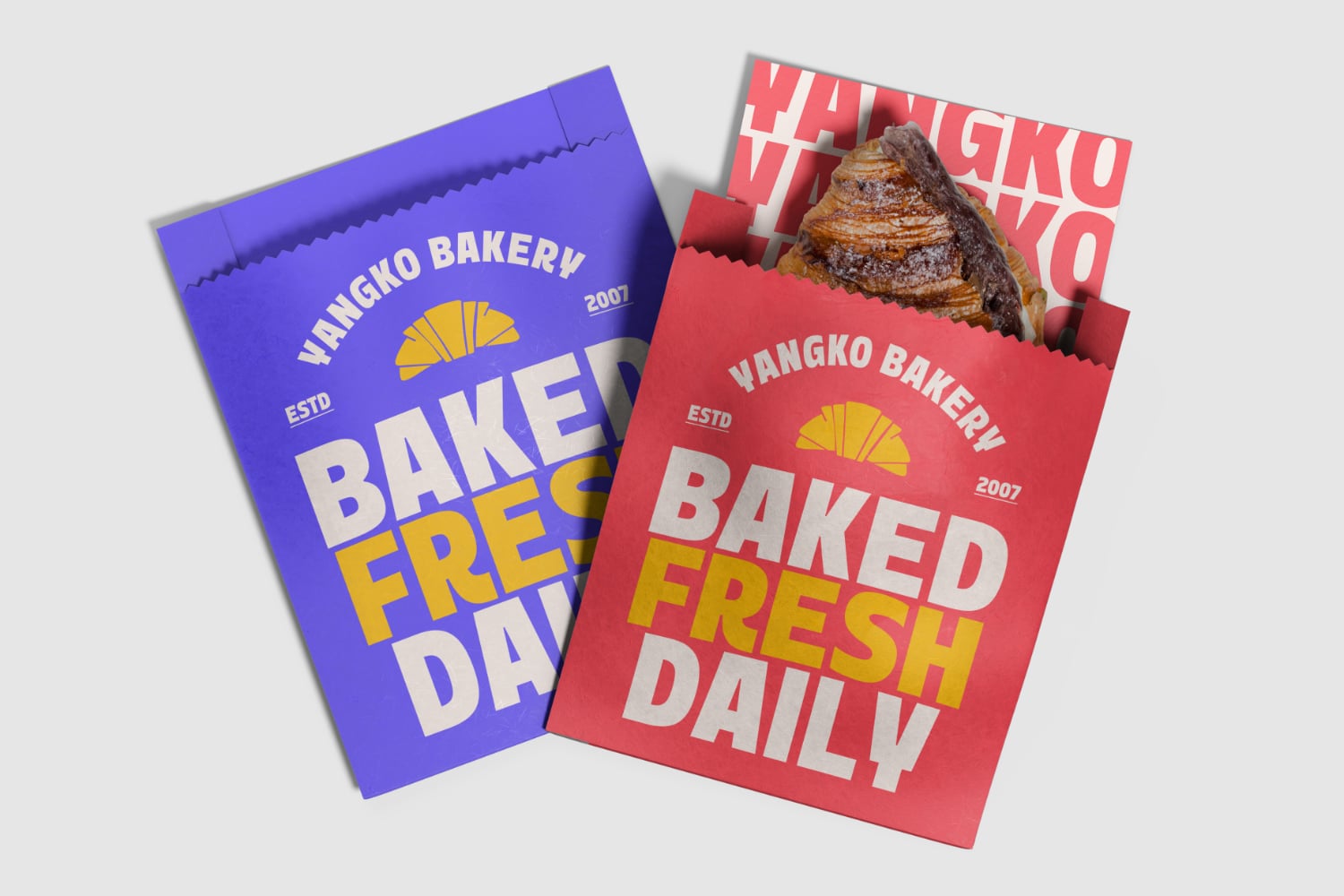 Wangko Bakery paper bag mockup in blue with red version showing croissant detail