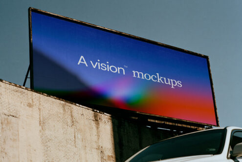 Outdoor billboard mockup with vibrant gradient background, mounted on weathered brick building