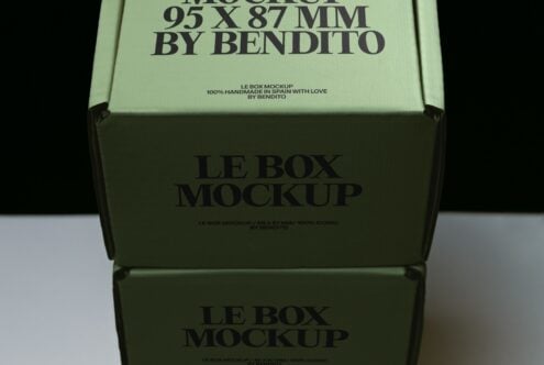 Stacked sage green boxes with bold serif typography showing lid, front, side panels for branding mockup
