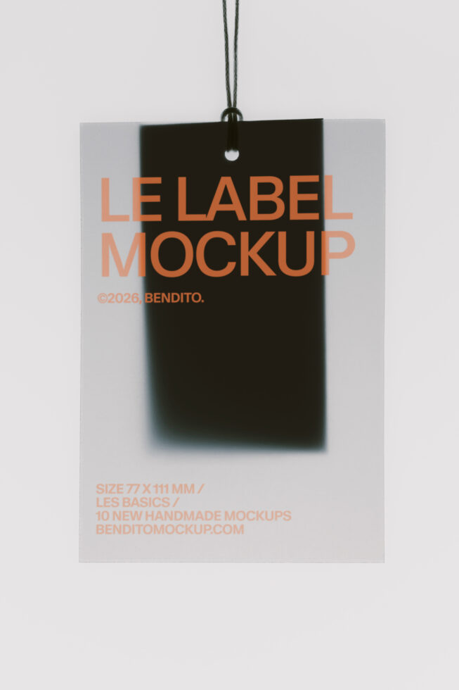 Hanging black tag mockup with orange text overlay on light gray background