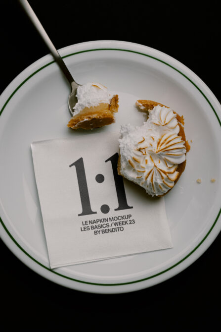 Napkin mockup styled with meringue pie slices on a ceramic plate with fork