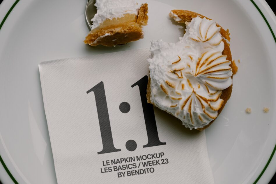 Napkin mockup with pastries on white plate, text reads 1.1 Les Basics Week 23
