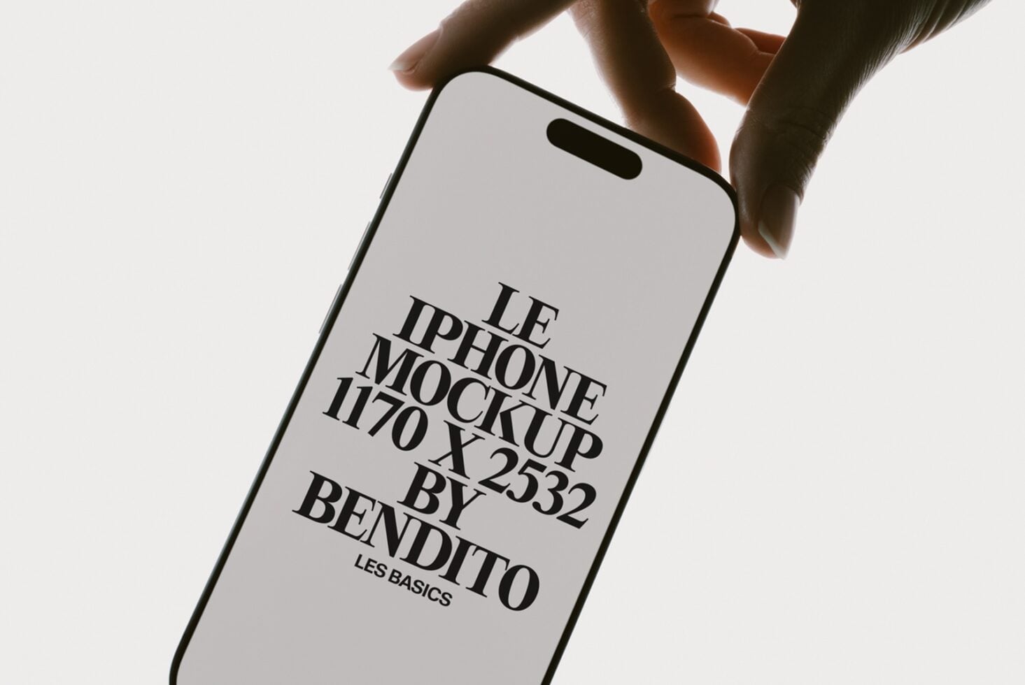 Hands holding iPhone 14 Pro Max with serif typography mockup on screen