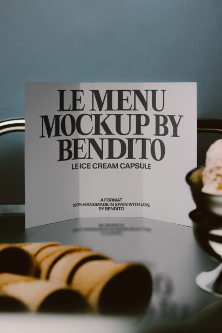 Minimalist ice cream menu mockup with serif typography on white card, styled with gold ribbons