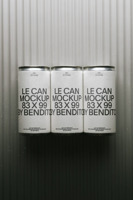 Three tall cans with metallic lids on corrugated backdrop, clean minimal branding mockup