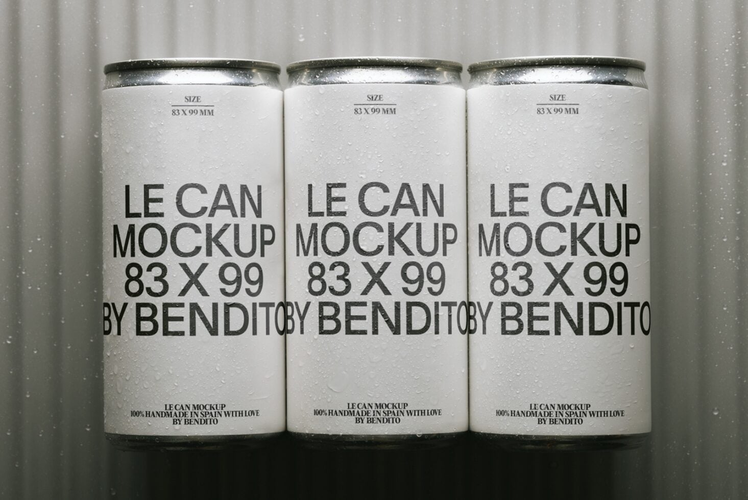 Three condensation-covered aluminum cans with minimalist black text on white label mockup