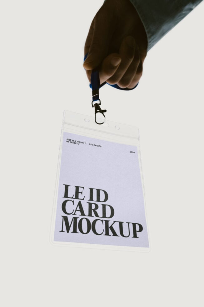 Hand holding clear ID badge with lavender card showing bold serif typography mockup
