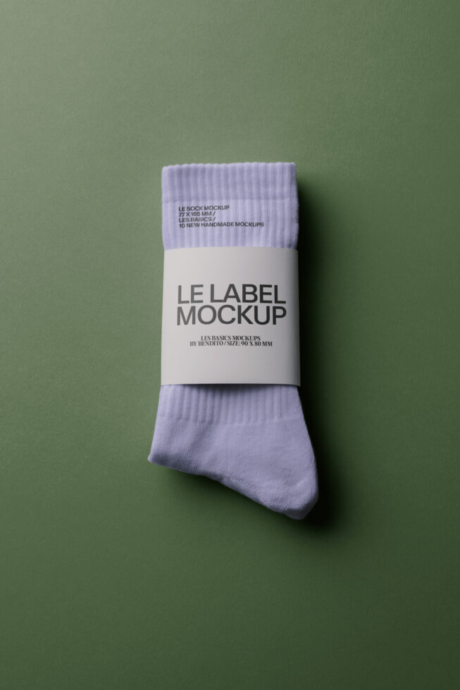 Lavender ribbed socks with white label band mockup on sage green background