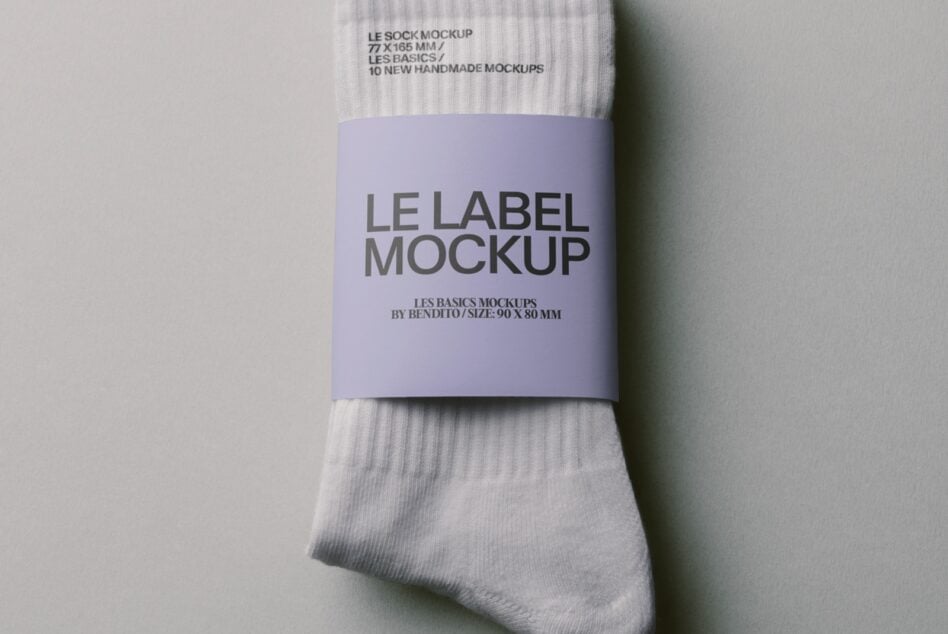 Lavender band label wrapped around white ribbed socks mockup from above