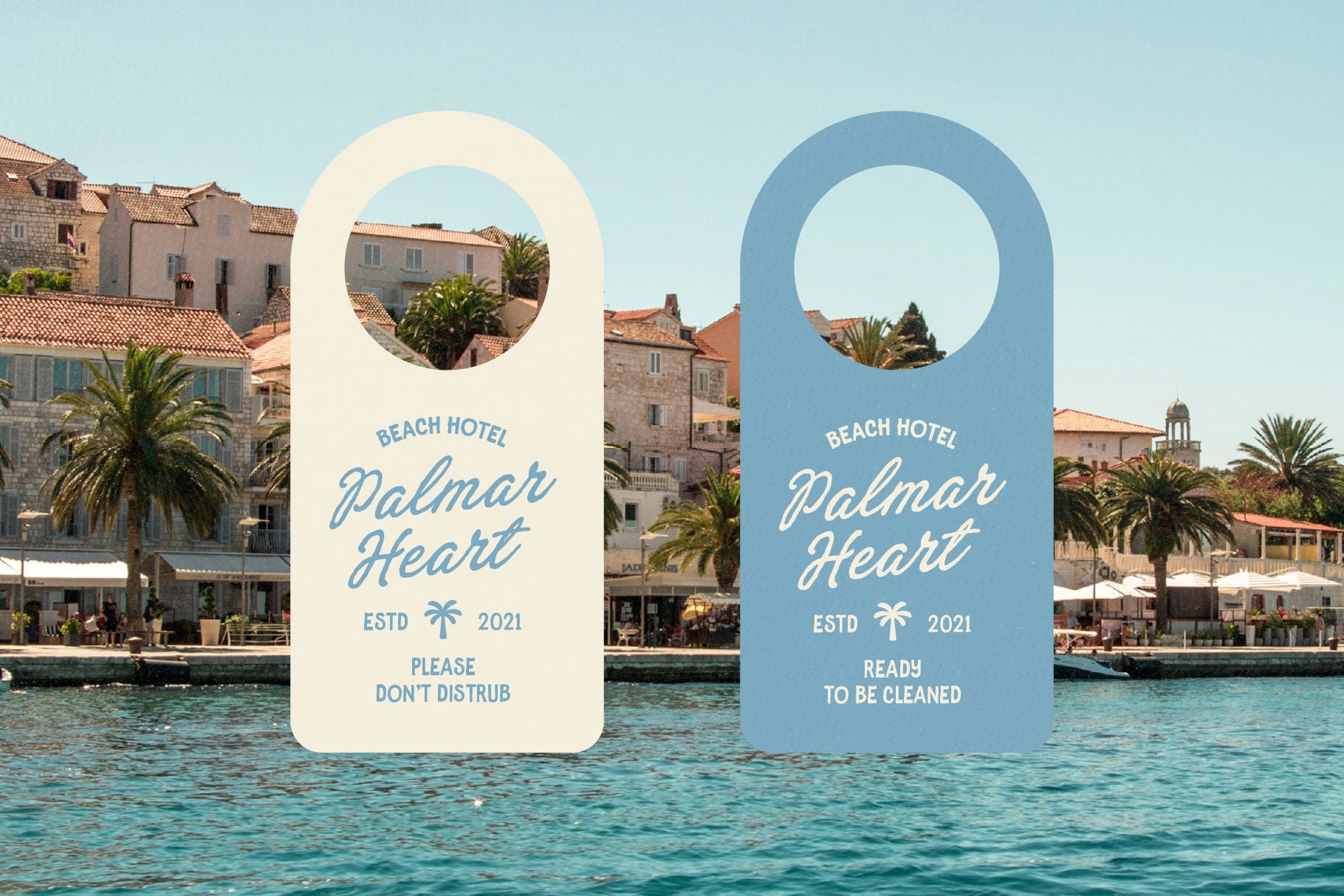 Door hanger mockup for beach hotel with cream plus blue versions overlooking coastal town