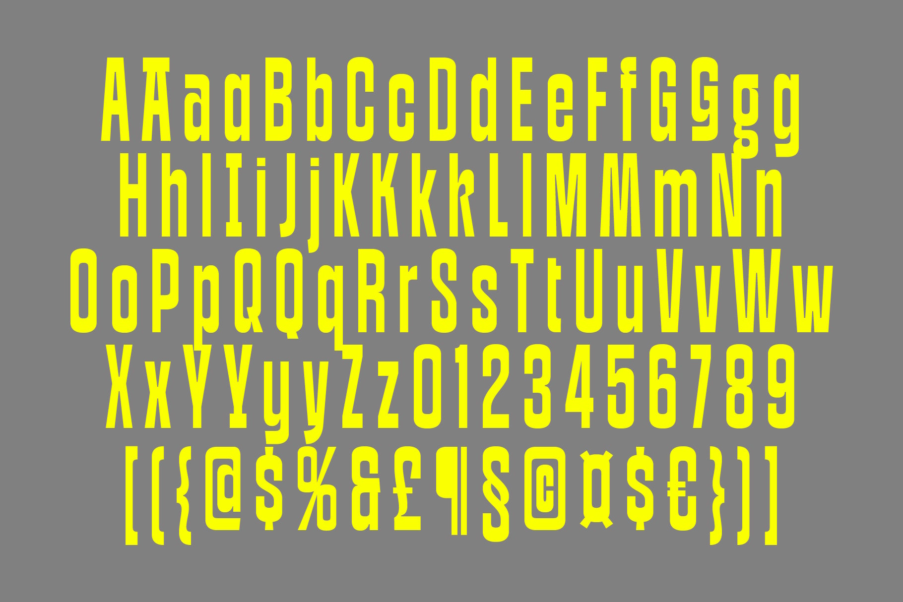 Bright yellow condensed typeface showing uppercase, lowercase, numbers, plus symbols on gray background