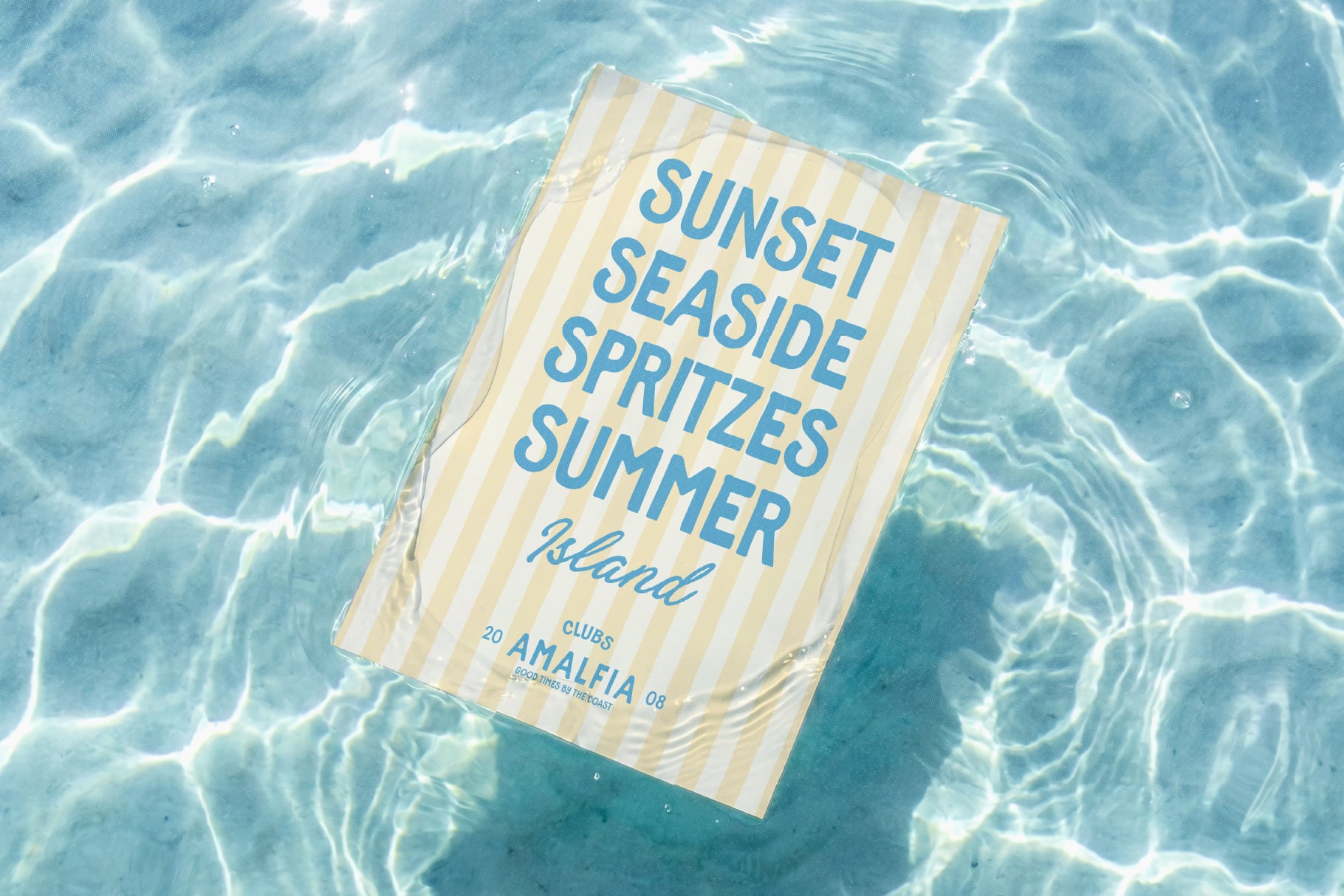 Striped beach towel floating in crystal pool water with blue text about summer vibes