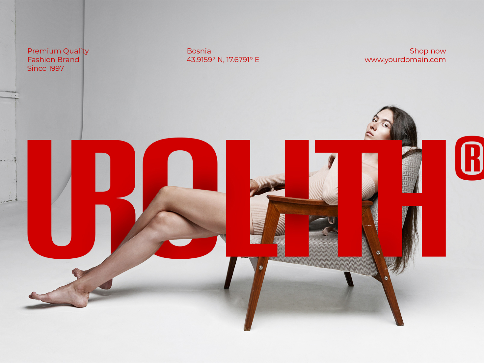 Fashion brand mockup with woman on mid-century chair, bold red typography overlay