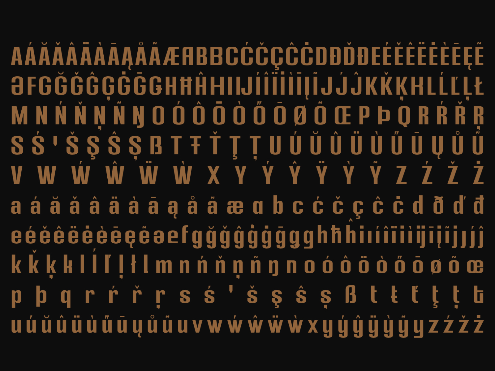 Gold serif font with extended character set showing accented letters on black background