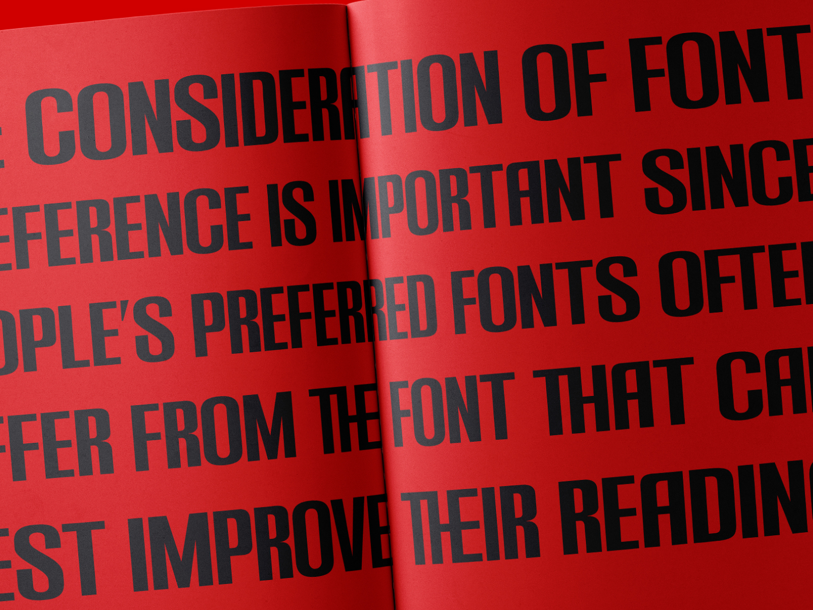 Bold black typography on vibrant red paper with a center fold creating depth