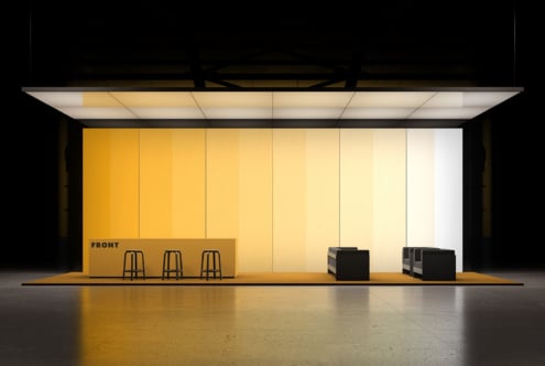 Sleek retail storefront mockup with mustard yellow panels, bar seating, black storage boxes, modern ceiling lights